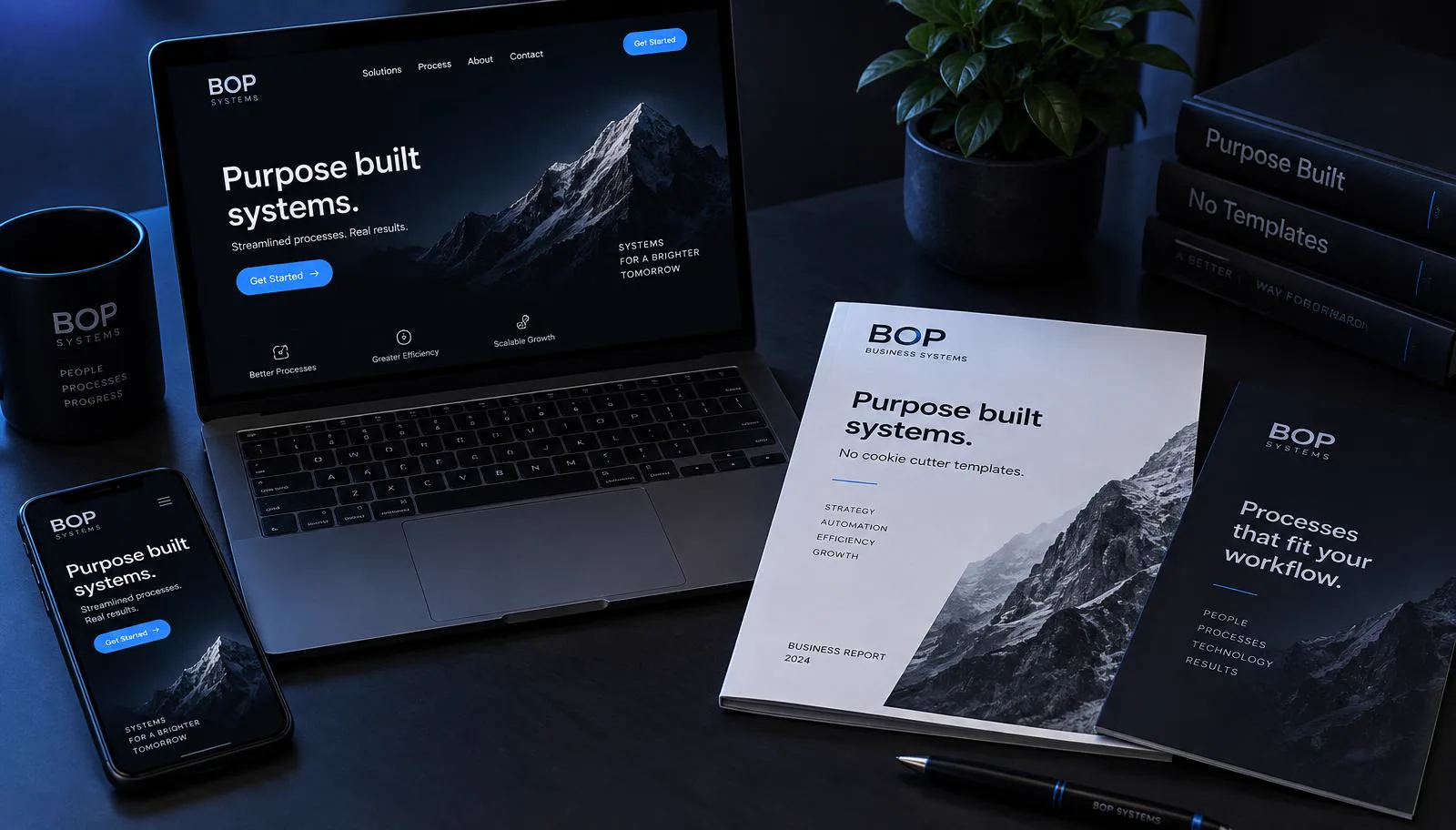 BOP Systems concept showcase: a tradie business website on a laptop with matching business cards, brochure and report